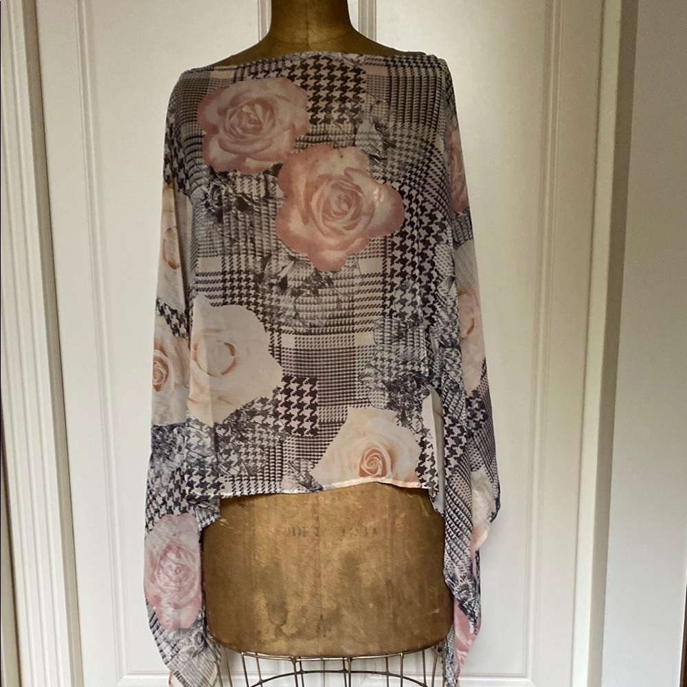 Multicolored Dolman Sleeve Asymmetrical Blouse. Brand new condition .